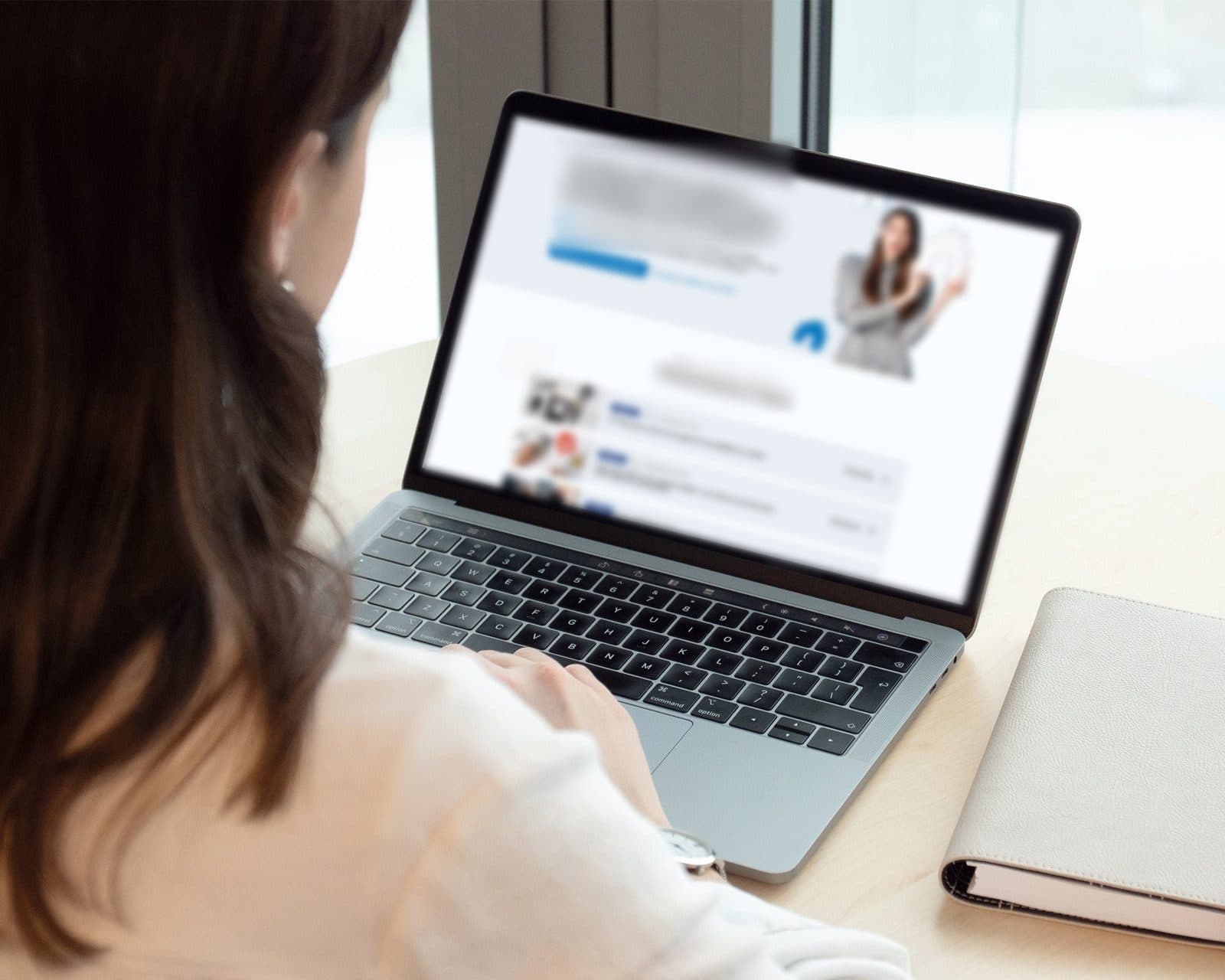 Person browsing the external platform on a computer: “Want to open your own real estate agency?” and a list of upcoming events.